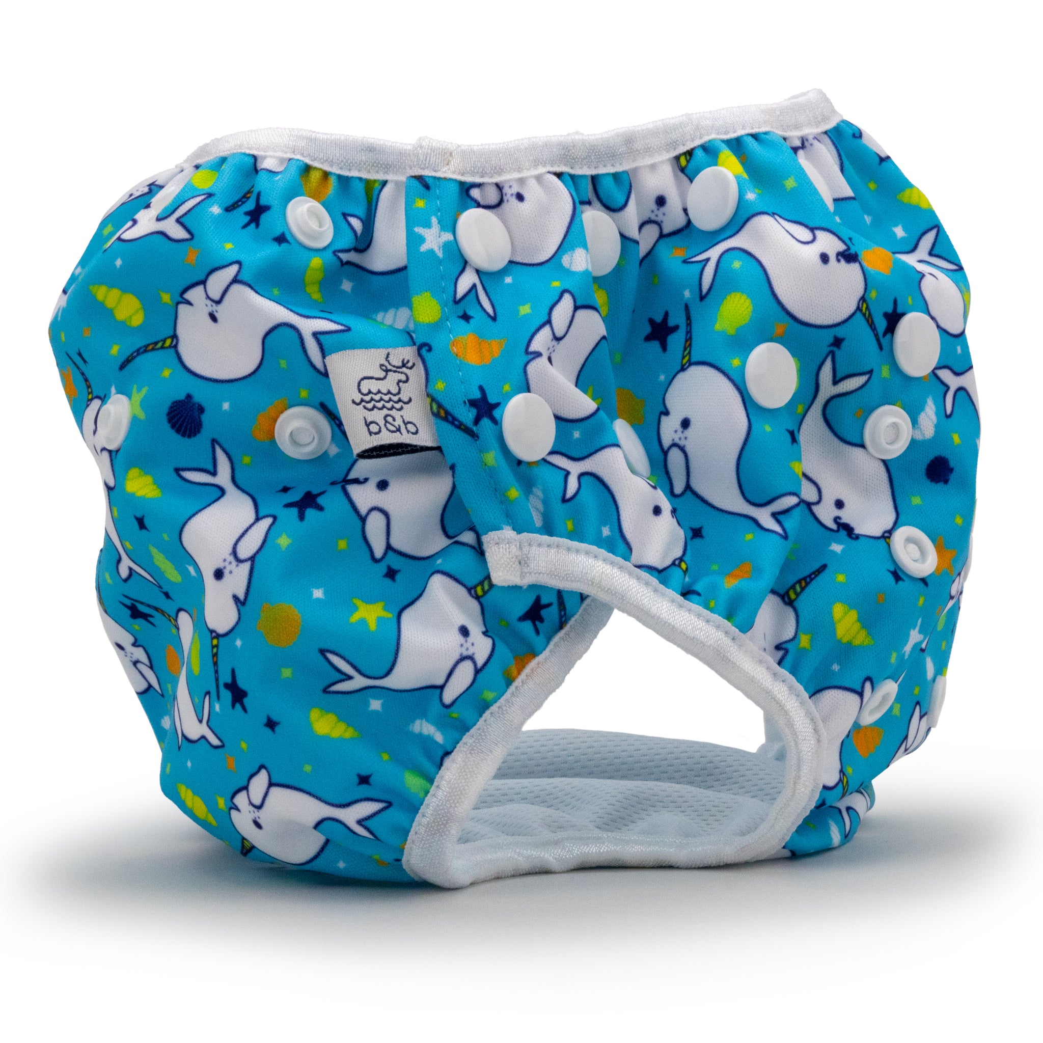 Reusable swim diaper with blue narhwal design, side view, large size.