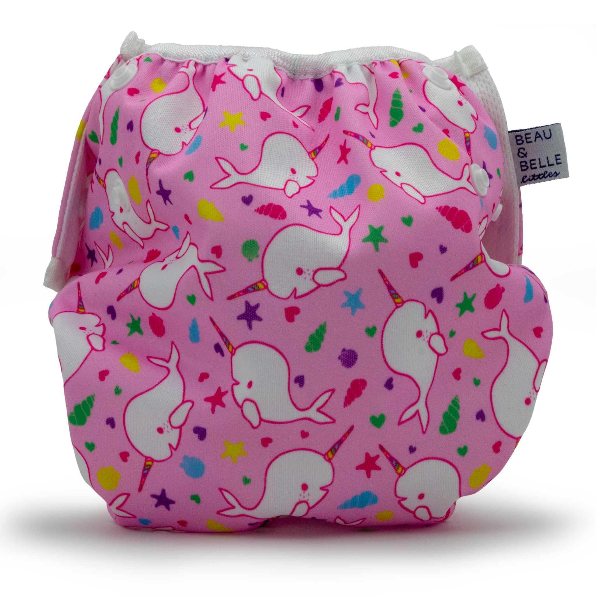 Reusable swim diaper with pink narhwal design, rear view.