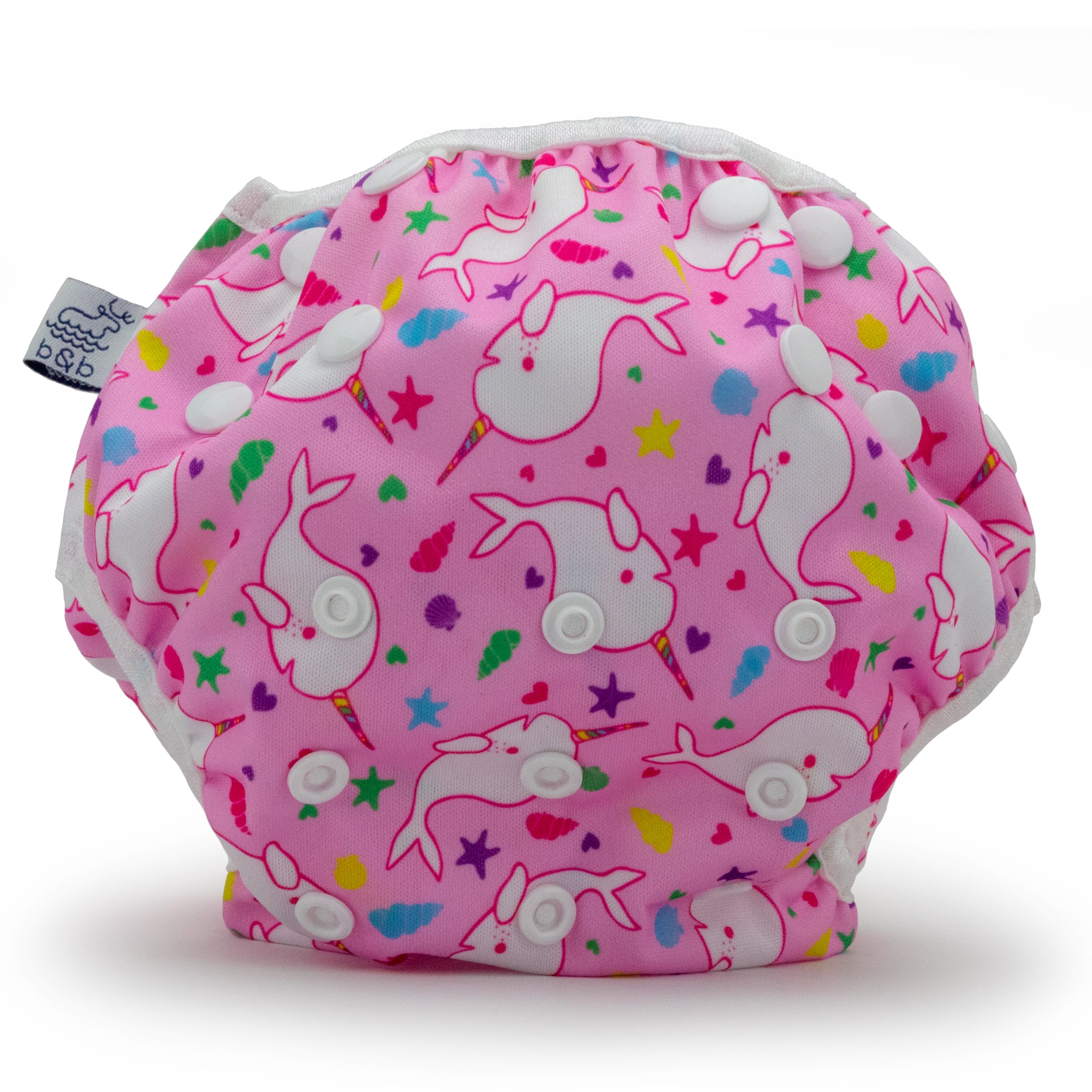 Reusable swim diaper with pink narhwal design, front view.