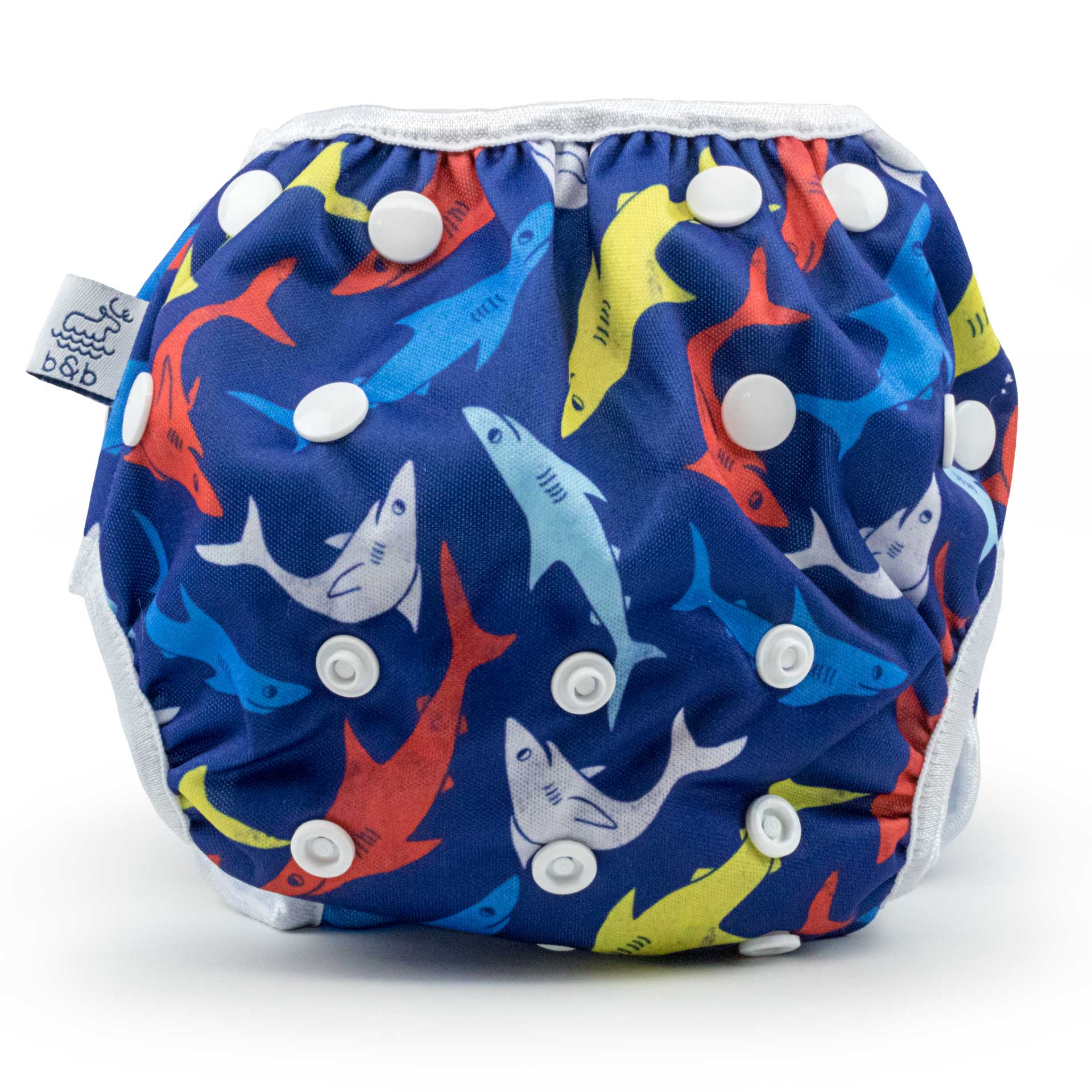 the swimming starter kit boys swim bottom with diaper included in a blue colorful shark pattern