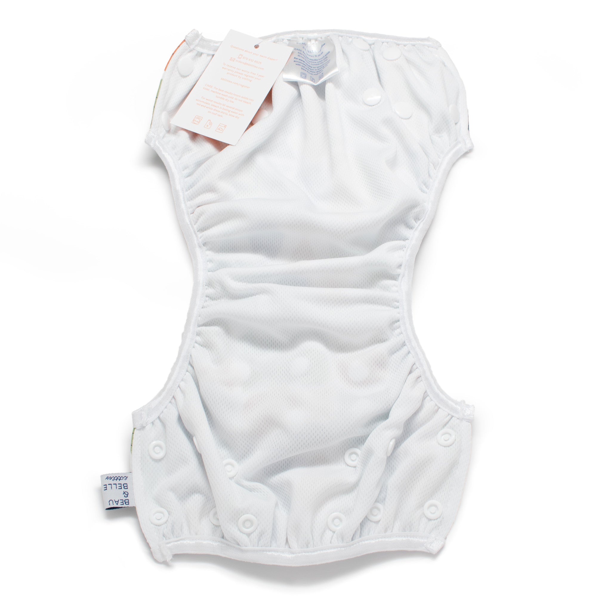 Beau and Belle Littles Swim Diaper, Regular Size, fish print, unbuttoned and laid flat to show the inner lining